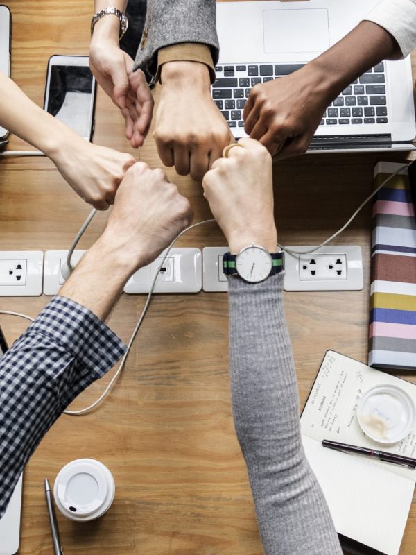 Colleagues giving a fist bump